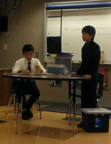 Bryan and Vincent compete in their first debate tournament.