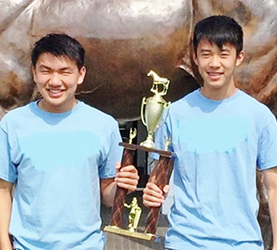ethan-and-aaron-trophy1-600x479