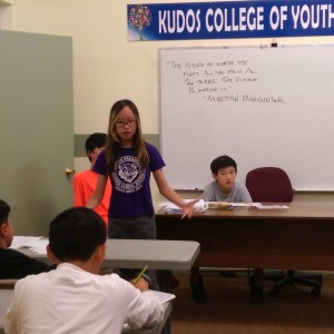 Sharon Liu, Level II student giving an Impromptu speech to Elementary studnets